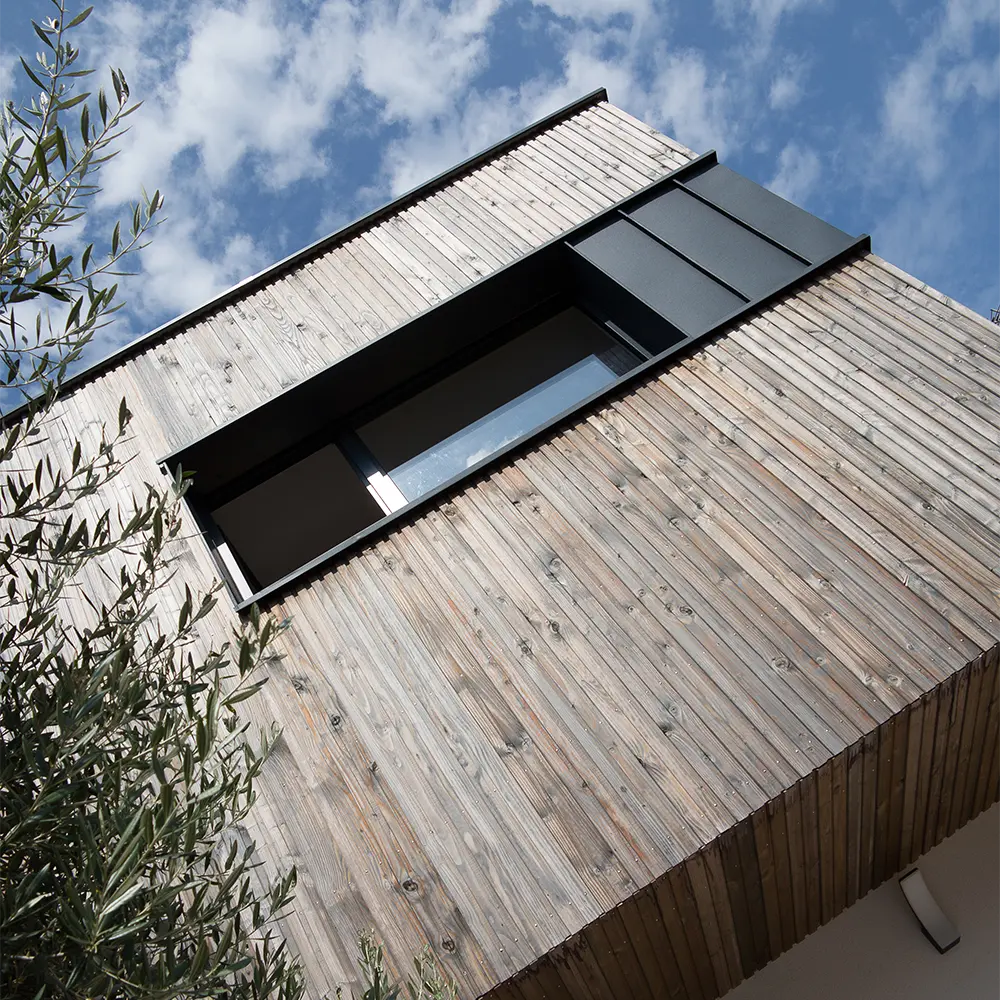 Façade en bardage bois et zinc